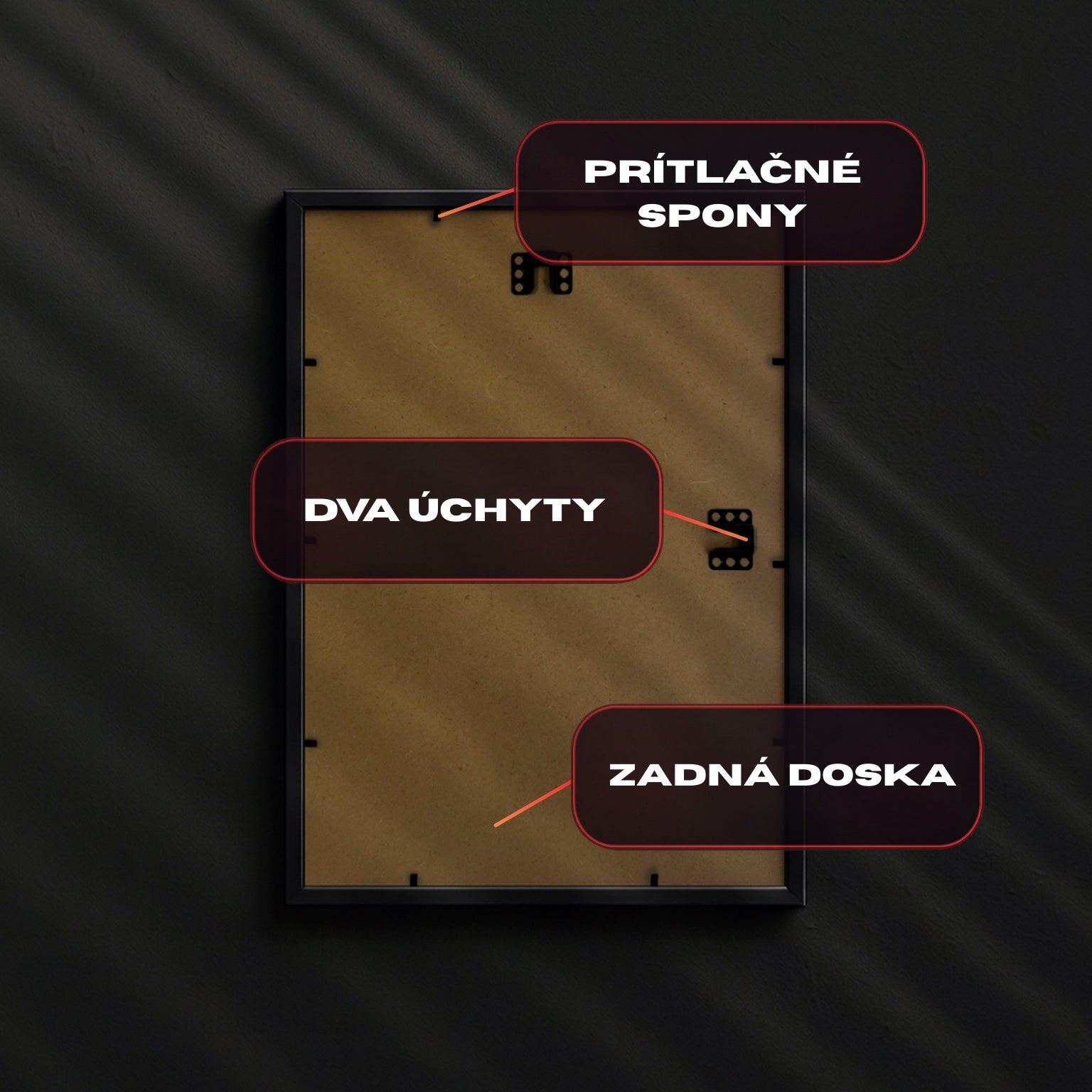 Zadná strana obrazu – prítlačné spony, dva úchyty a zadná doska